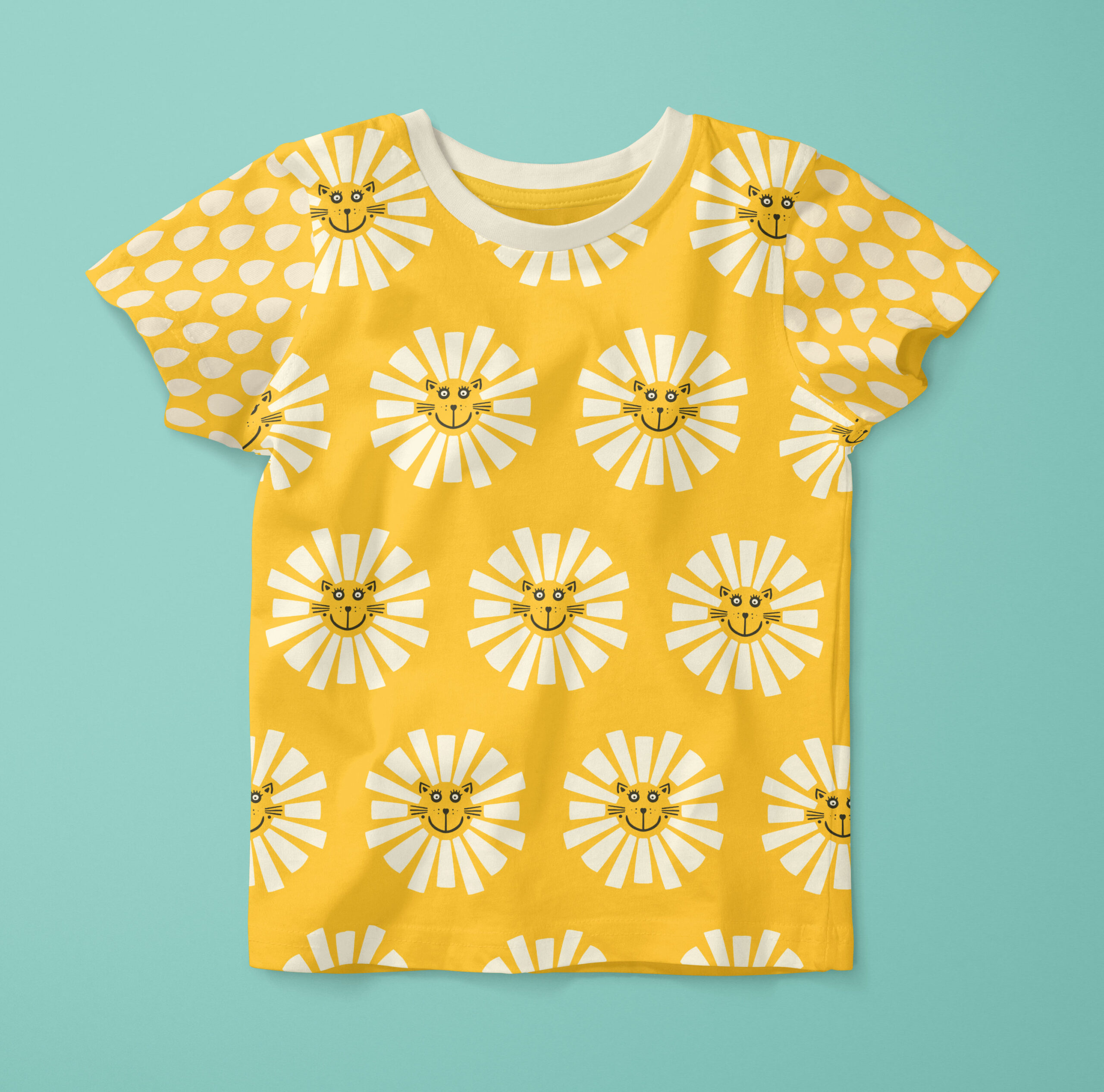 Fun baby short-sleeve t-shirt in happy retro yellow with abstract black and white cat suns in the middle and hand-drawn bold vintage white raindrops on the sleeves. The shirt is presented on a soft pastel baby blue background.