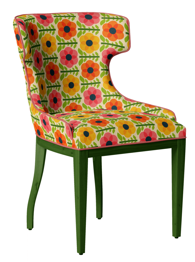 Upholstered chair where the bold pink, yellow and orange flowers with stems and leaves direct into the wrong direction from left to right, instead upwards.