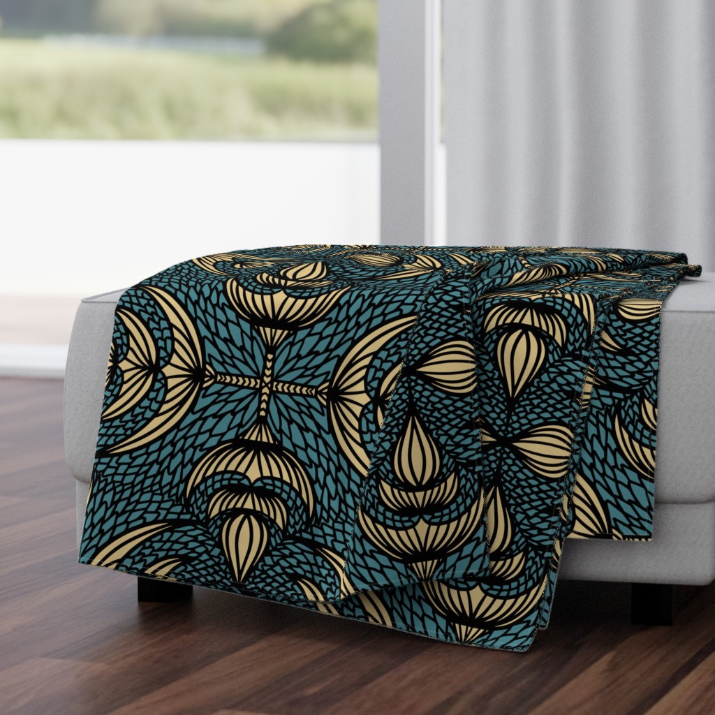 Matching throw blanket with teal blue brandy beige dragon scale pattern