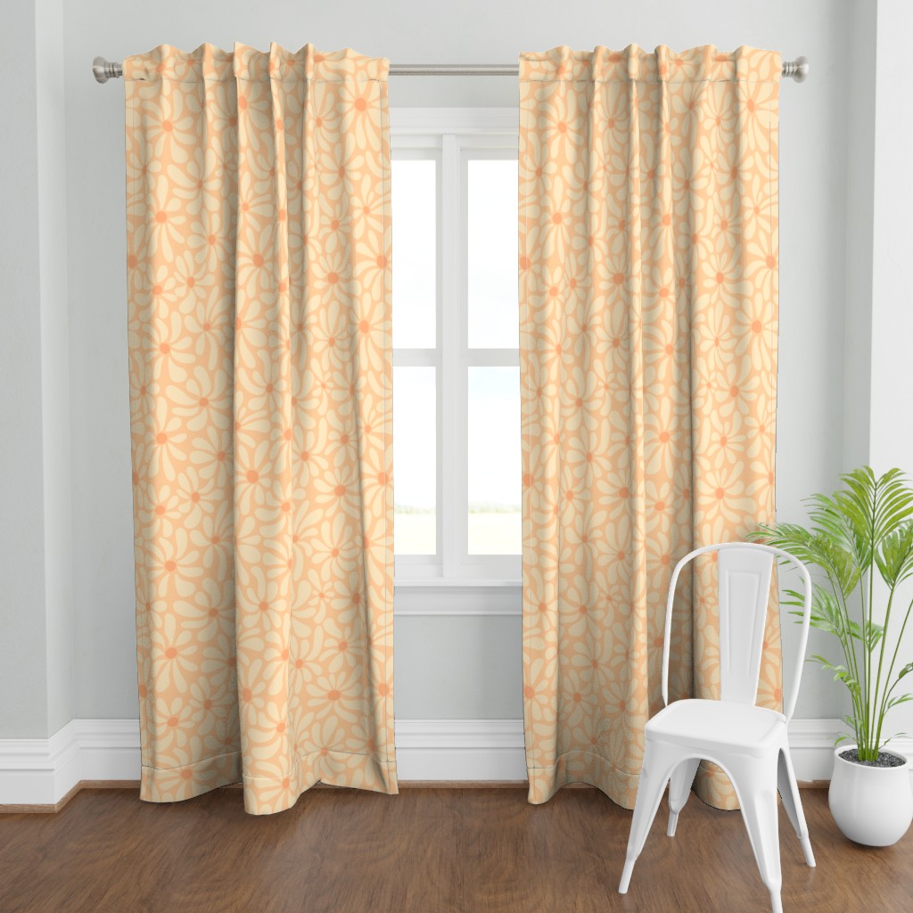 Light pastel peach and beige curtains with a stylized daisy floral pattern in a cozy room featuring white walls, a white metal chair, and a potted green plant on wood flooring. The design blends 1950s and cottagecore soft style aesthetics with a whimsical and modern coastal casual feel.